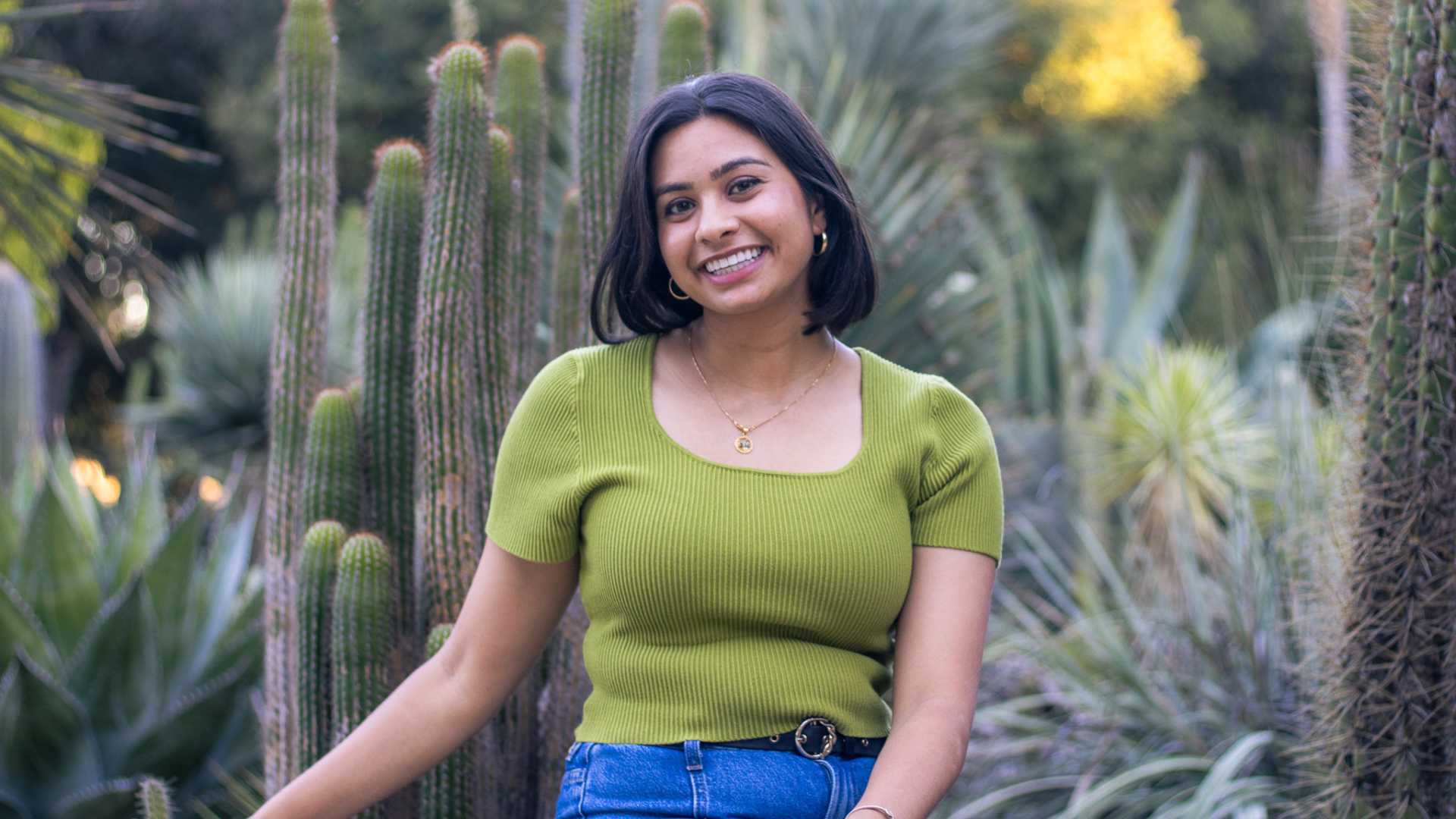 Izma sitting the the catcus garden on the Stanford campus