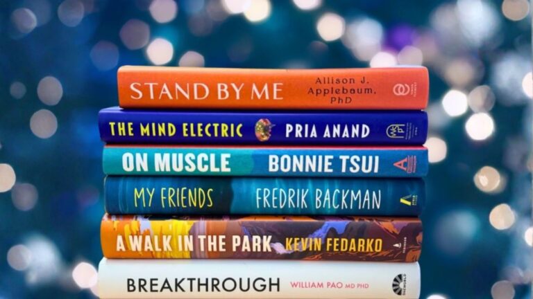 stack of books on the reading list with spines showing